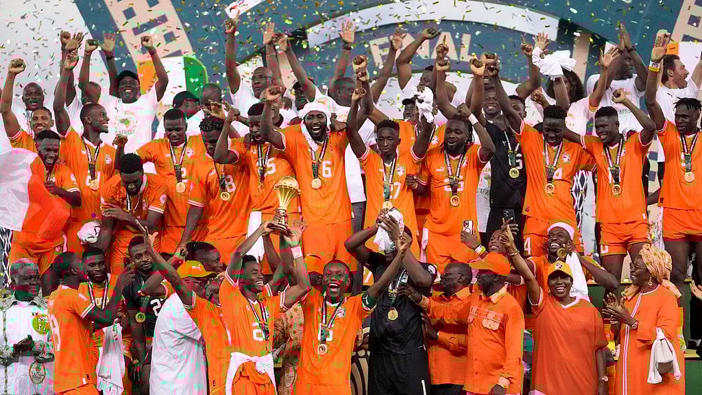 AP : Ivory Coast players celebrate after winning the AFCON African Cup of Nations 2024 final match against Nigeria at the Olympic Stadium of Ebimpe in Abidjan on February 11, 2024.