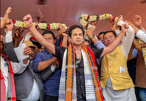 (Image Source: PTI ) : TIPRA founder Pradyot Kishore Manikya Debbarma with supporters