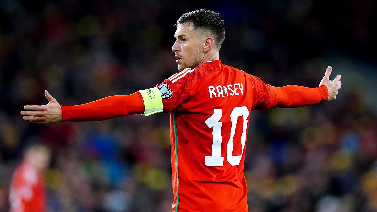 | Photo: PA/David Davies via AP : File photo of Aaron Ramsey in action for Wales.