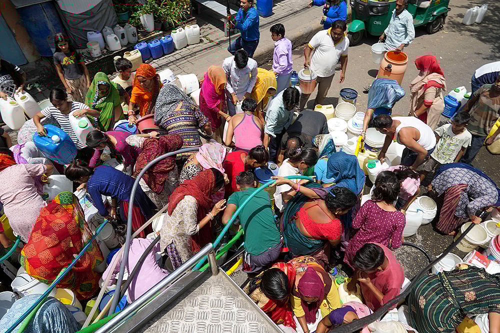 | Photo: PTI/Atul Yadav : Water Crisis