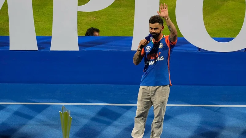 Virat Kohli speaks and waves during T20 Cricket World Cup win ceremony at Wankhede Stadium
