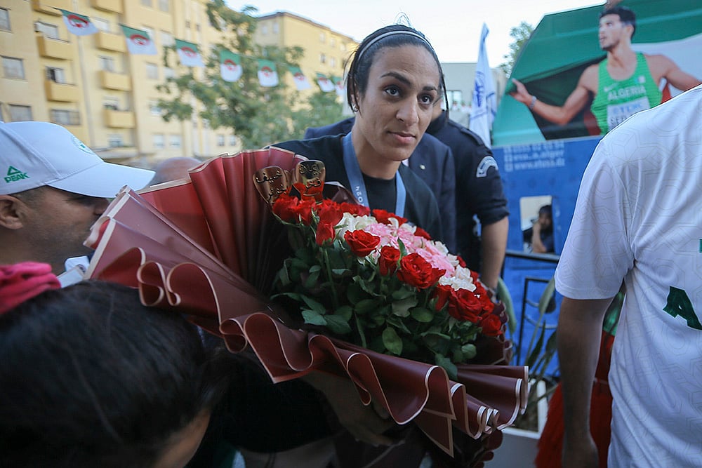 | Photo: AP/Anis Belghoul : Olympic gold medalist in the womens 66 kg boxing Algerias Imane Khelif