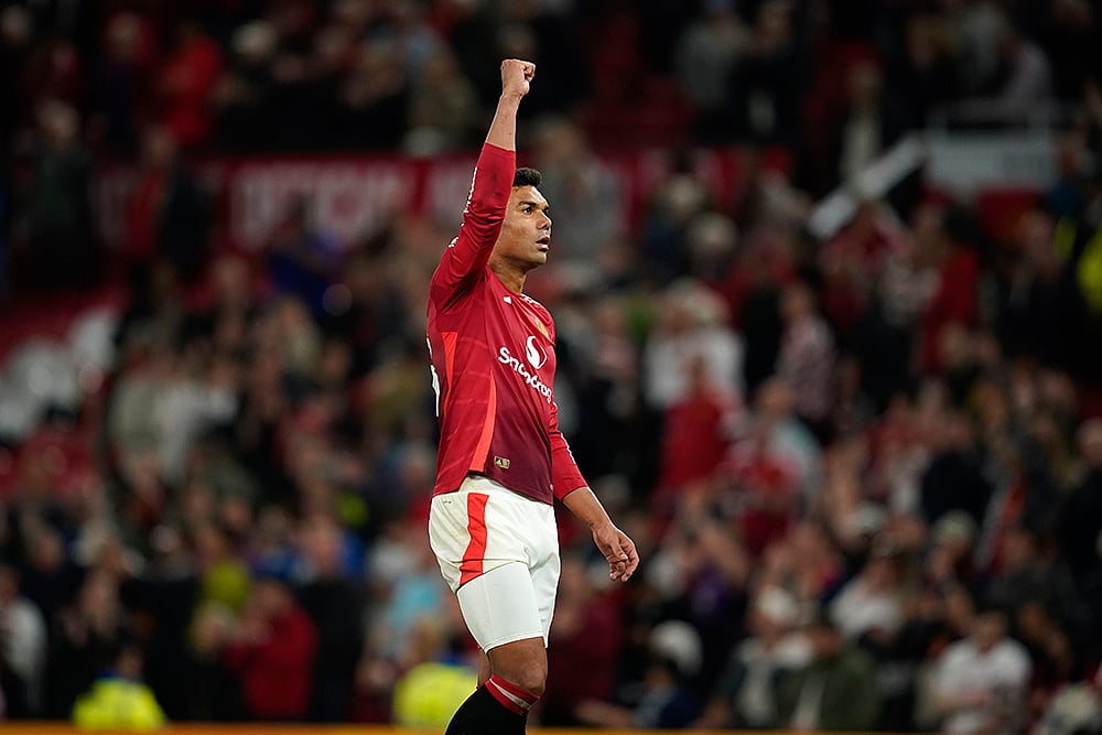 | Photo: AP/Dave Thompson : Manchester United Vs Fulham: Man Uniteds Casemiro celebrates at the end of match