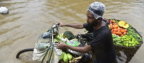 Photo: PTI : Weather: Heavy rainfall in Guwahati