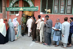 | Photo: PTI : J&K Assembly elections, 2nd Phase voting: People wait in queues to cast their votes in Srinagar