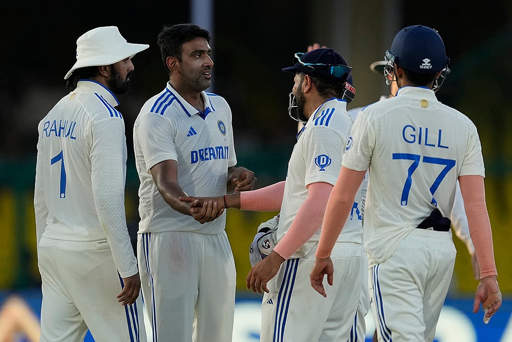 | Photo: AP/Ajit Solanki : India vs Bangladesh 2nd Test Day 4: Indias Ravichandran Ashwin, second left, celebrates the wicket of Bangladeshs Hasan Mahmud