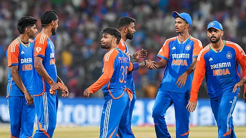 PTI Photo/Arun Sharma : Indias Arshdeep Singh celebrates with teammates after taking the wicket of Bangladeshs Mustafizur Rahman during the first T20 International cricket match between India and Bangladesh.