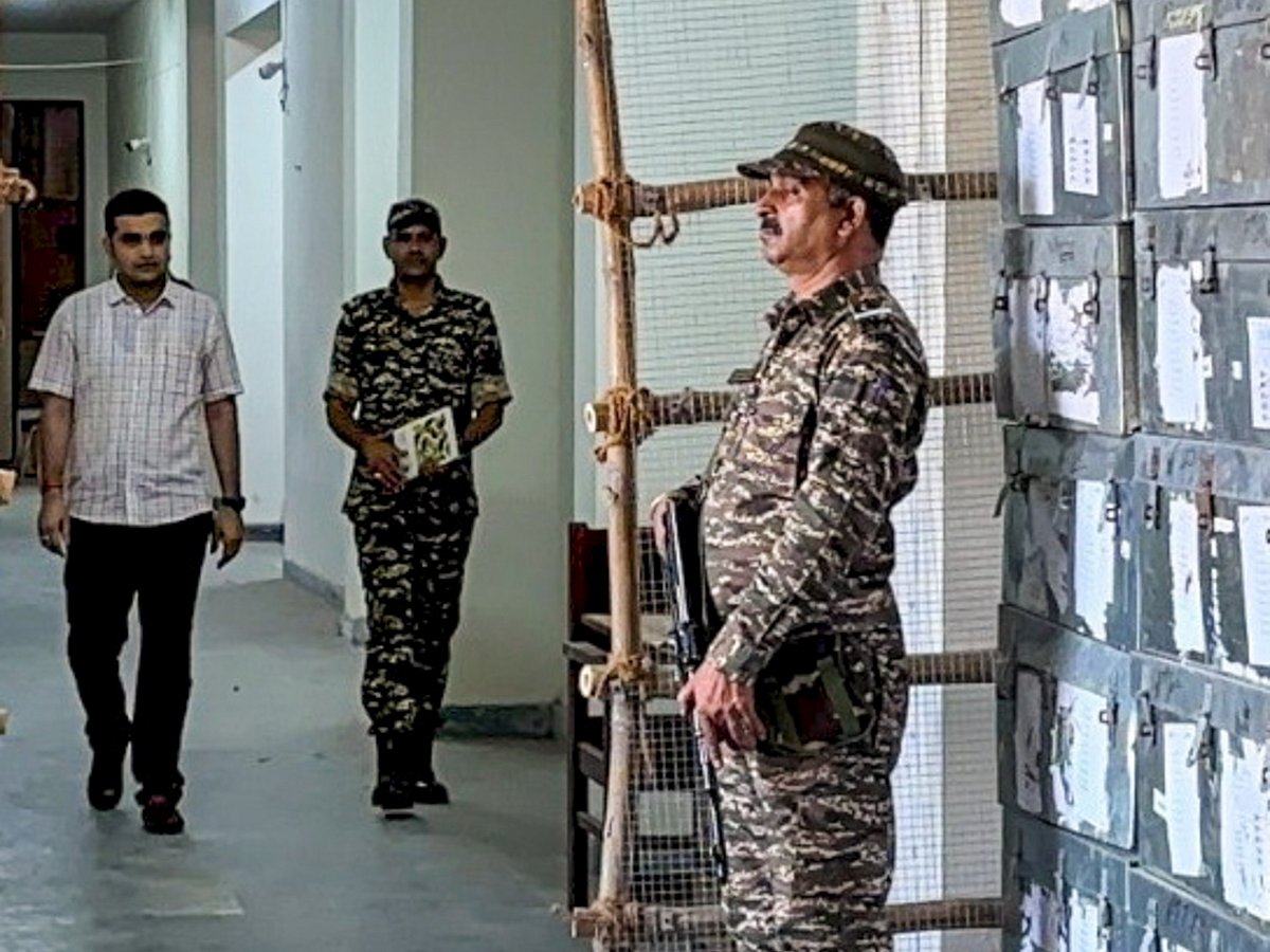PTI : District Election Officer and Deputy Commissioner Vikram Singh (L) inspects strong rooms ahead of the counting of votes of the Haryana Assembly elections, in Faridabad district, Sunday, Oct. 6, 2024