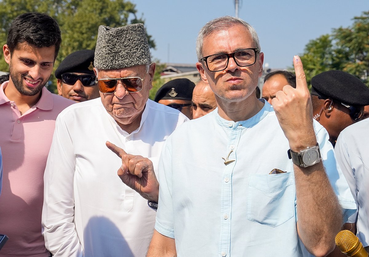 PTI : Omar Abdullah and Farooq Abdullah after casting their vote