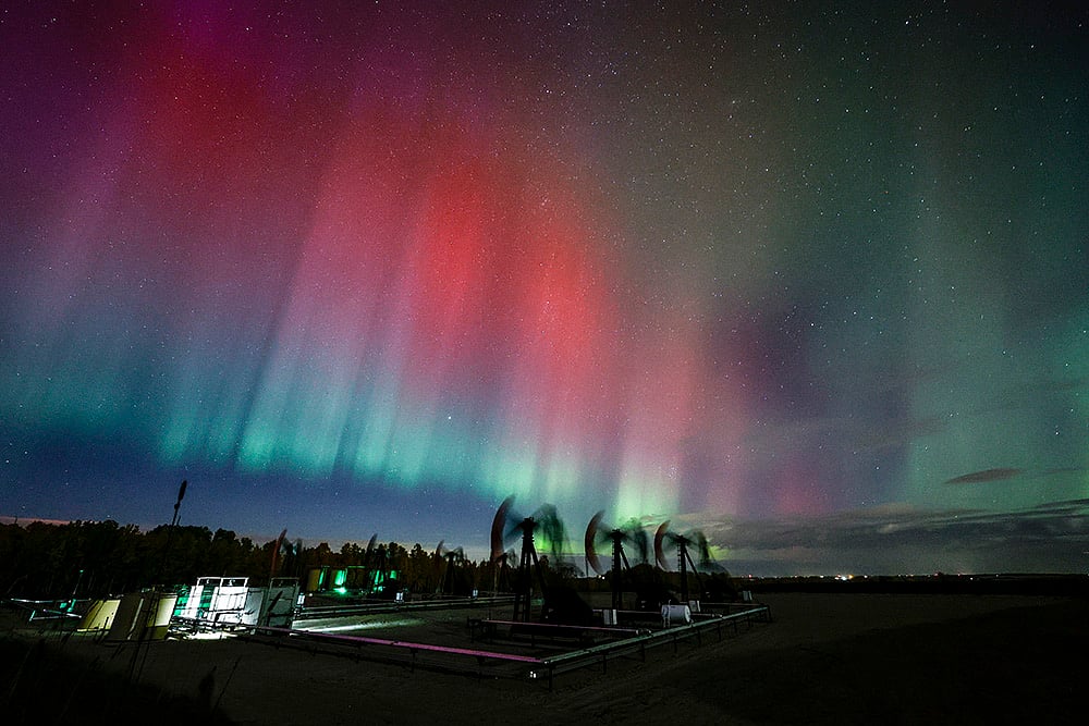 | Photo: Jeff McIntosh/The Canadian Press via AP : Aurora Borealis in Alberta