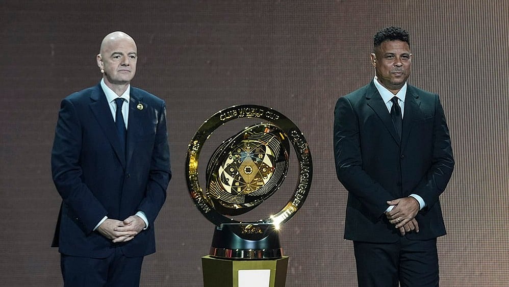 | Photo: AP/Rebecca Blackwell : FIFA Club World Cup Draw: Gianni Infantino' and Former Brazilian player Ronaldo present a new trophy