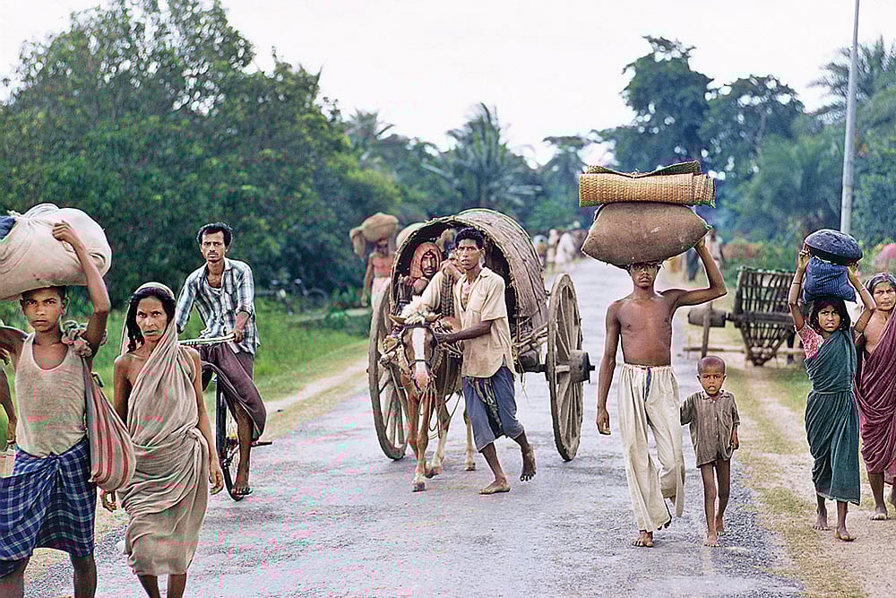 | Photo: Getty images : The Uprooted: Refugees from East Pakistan (now Bangladesh) at the outskirts of Calcutta in 1971 