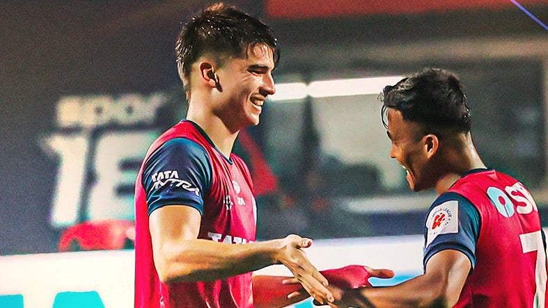 X/Indian Super League : Javier Siverio (left) celebrates after scoring a goal for Jamshedpur FC against Punjab FC during their Indian Super League 2024-25 clash at the JRD Tata Sports Complex on Friday (December 13, 2024).