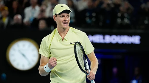 AP Photo/Ng Han Guan : Jannik Sinner of Italy celebrates after defeating Ben Shelton of the U.S. in their semifinal match at the Australian Open tennis championship in Melbourne.