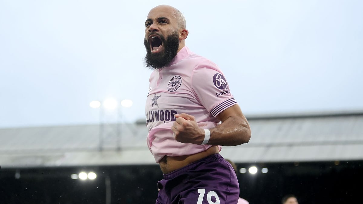 Mbeumo celebrates after scoring his penalty