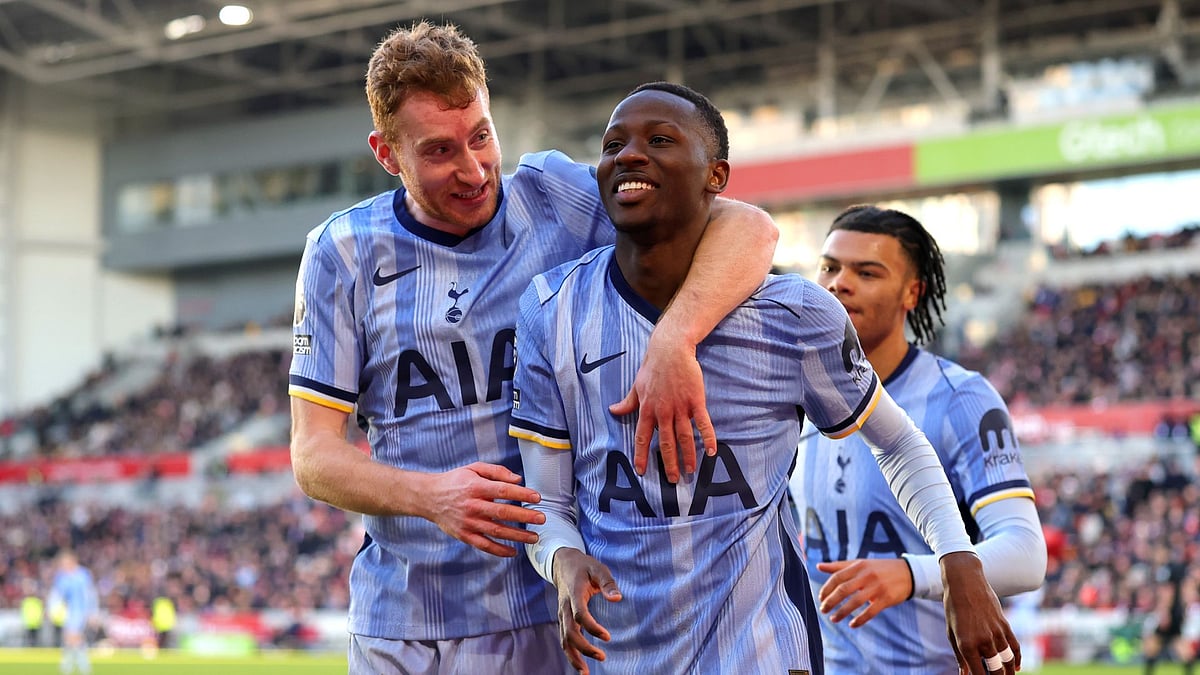 Tottenham celebrate Sarr's goal