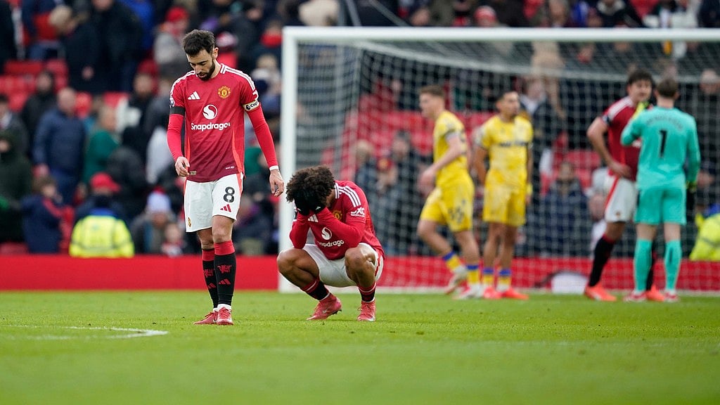 AP : Manchester United's Bruno Fernandes, left, and teammate Joshua Zirkzee react after their loss to Crystal Palace.