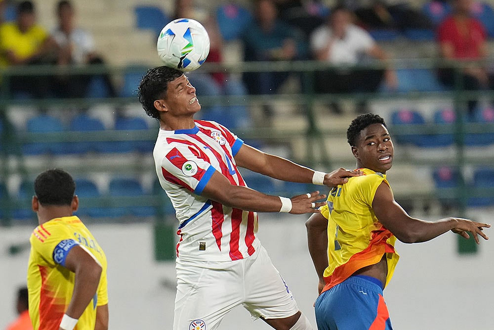 | Photo: AP/Ariana Cubillos : Action from South American U-20 Championship game between Paraguay and Colombia.