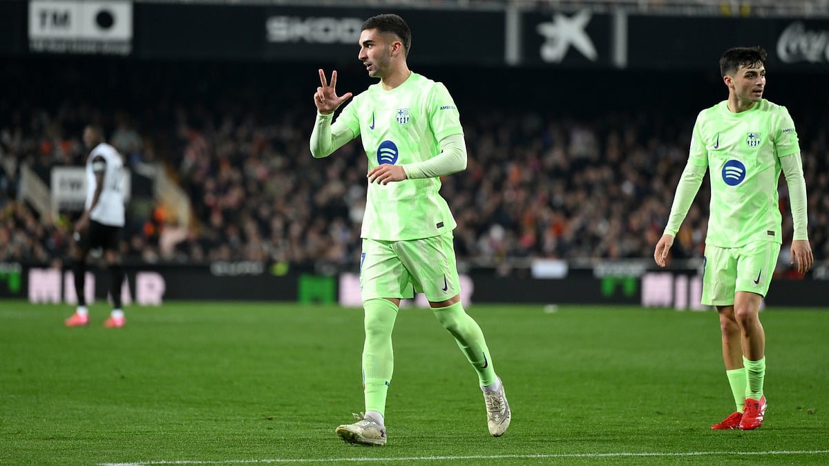 Ferran Torres celebrates his third goal against Valencia
