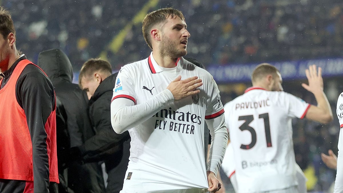 Gimenez celebrates his first goal for Milan