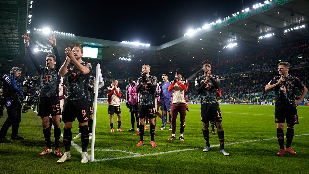 Bayern Munich's players celebrate their win at Celtic Park