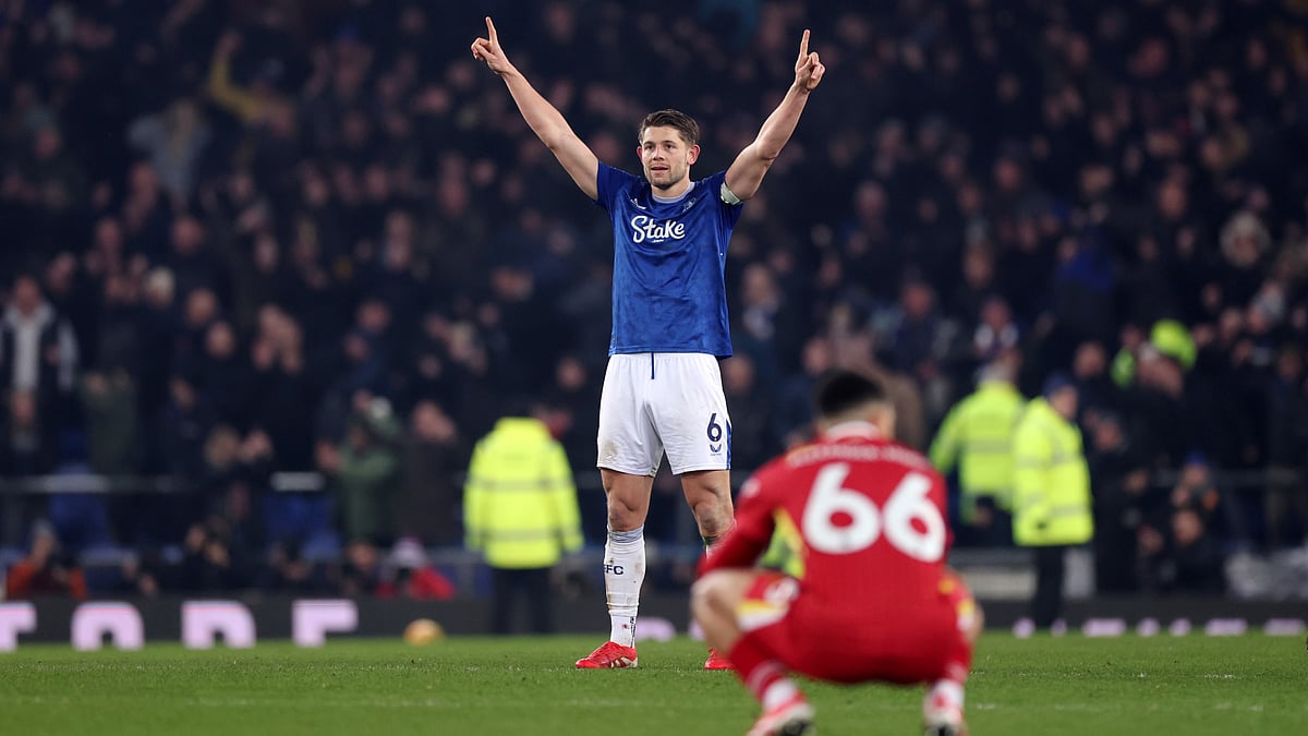 James Tarkowski celebrates his equaliser against Liverpool