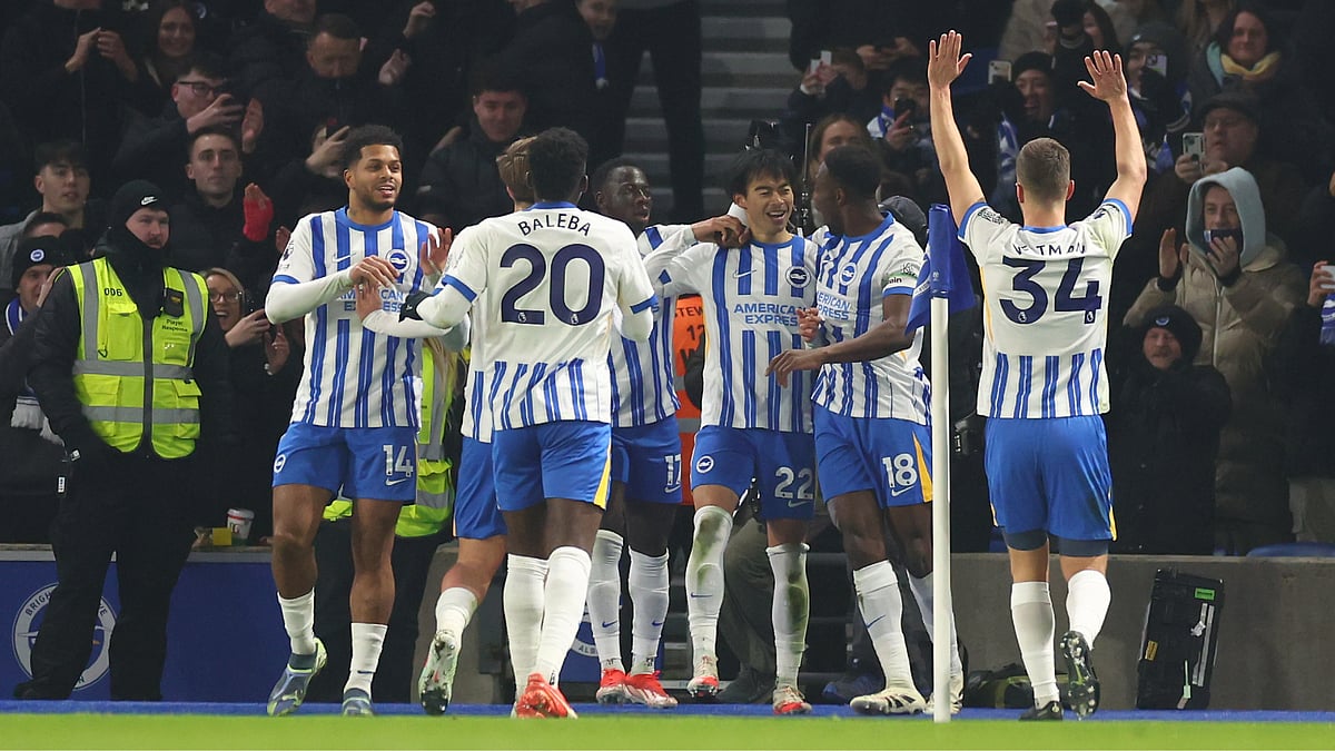 Brighton celebrate their goal against Chelsea.
