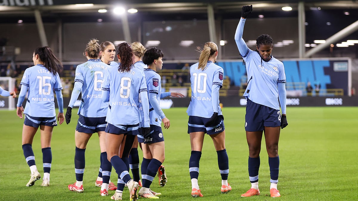 Khadija Shaw celebrates her first-half double against Liverpool