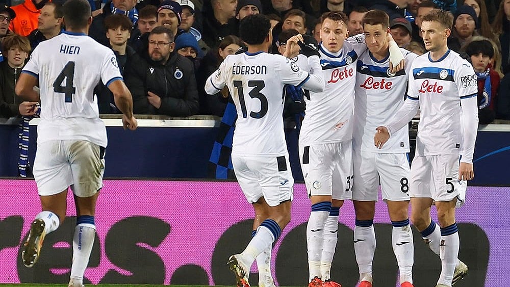 | Photo: AP/Geert Vanden Wijngaert : Champions League playoff first leg: Atalanta's Mario Pasalic celebrates with his teammates after scoring against Brugge