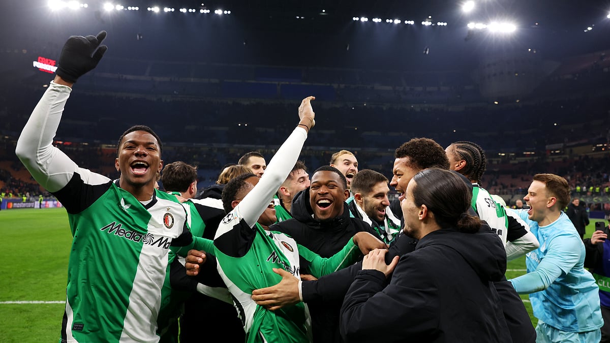Feyenoord celebrate at San Siro on Tuesday