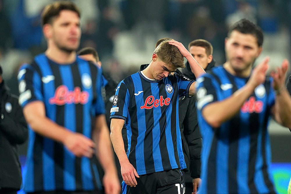 | Photo: Spada/LaPresse via AP : Champions League Soccer playoff second leg: Atalanta's Charles De Ketelaere reacts after the match