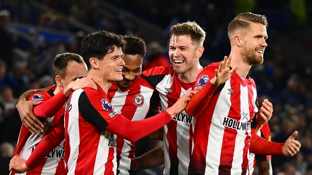 Christian Norgaard celebrates his goal with his Brentford team-mates