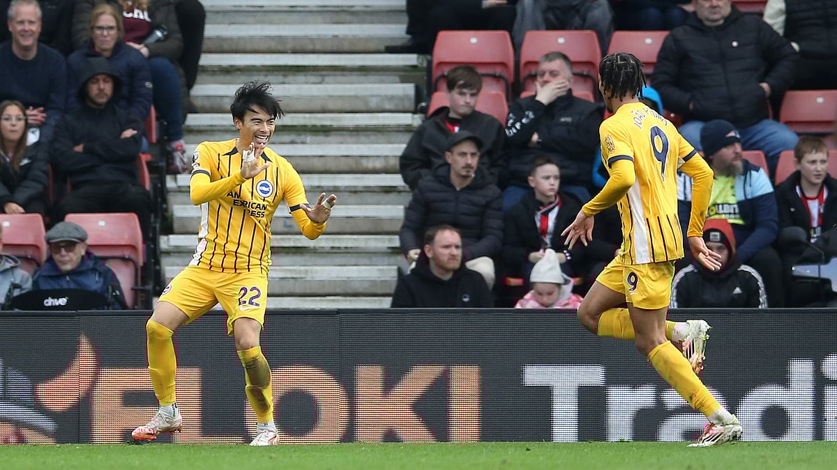 Kaoru Mitoma celebrates his goal with Joao Pedro during Brighton's 4-0 win at Southampton.