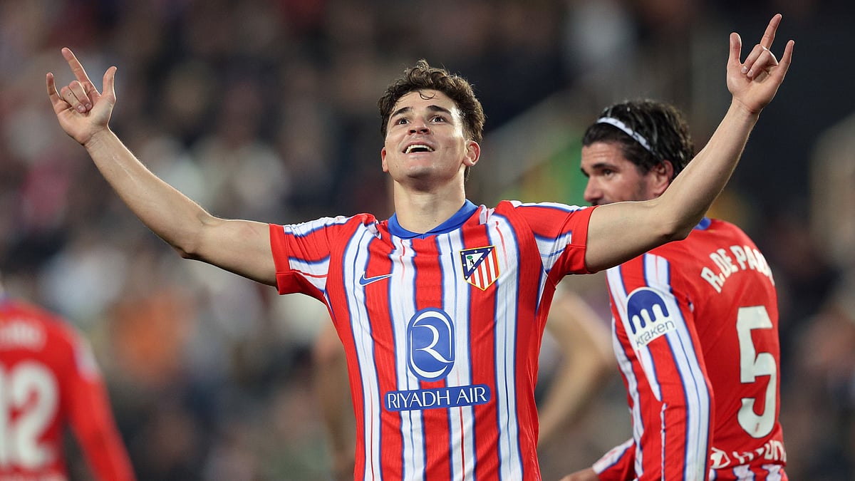 Julian Alvarez celebrates after scoring one of his two goals against Valencia