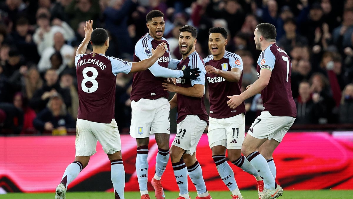 Marcus Rashford celebrates with his Villa team-mates