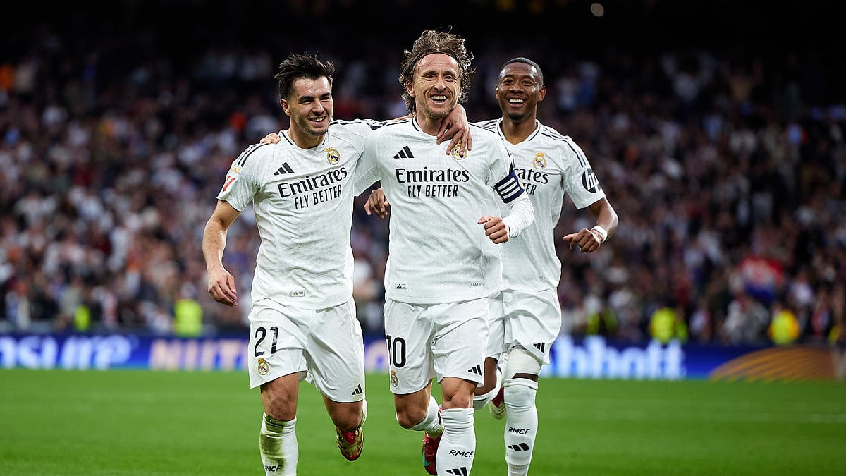 Luka Modric celebrates for Real Madrid
