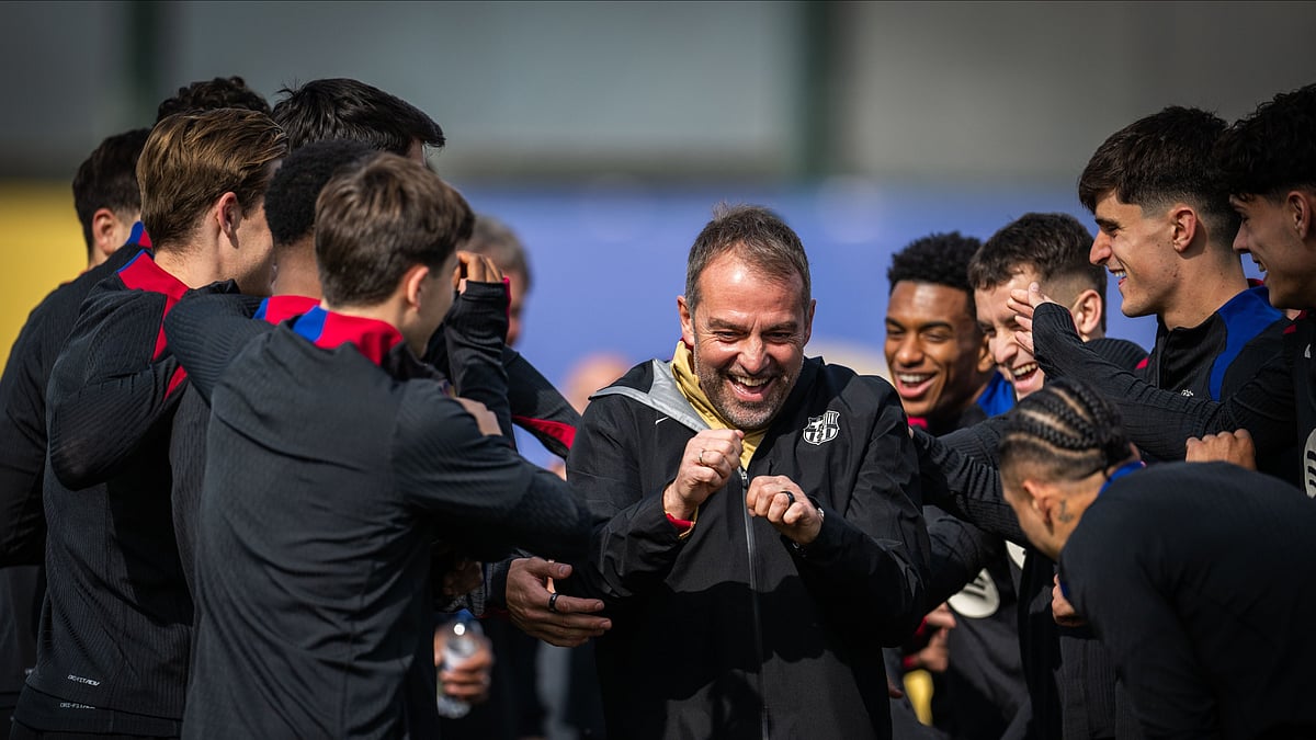 Photo: X | Barcelona FC : Barcelona FC players with head coach Hansi Flick.