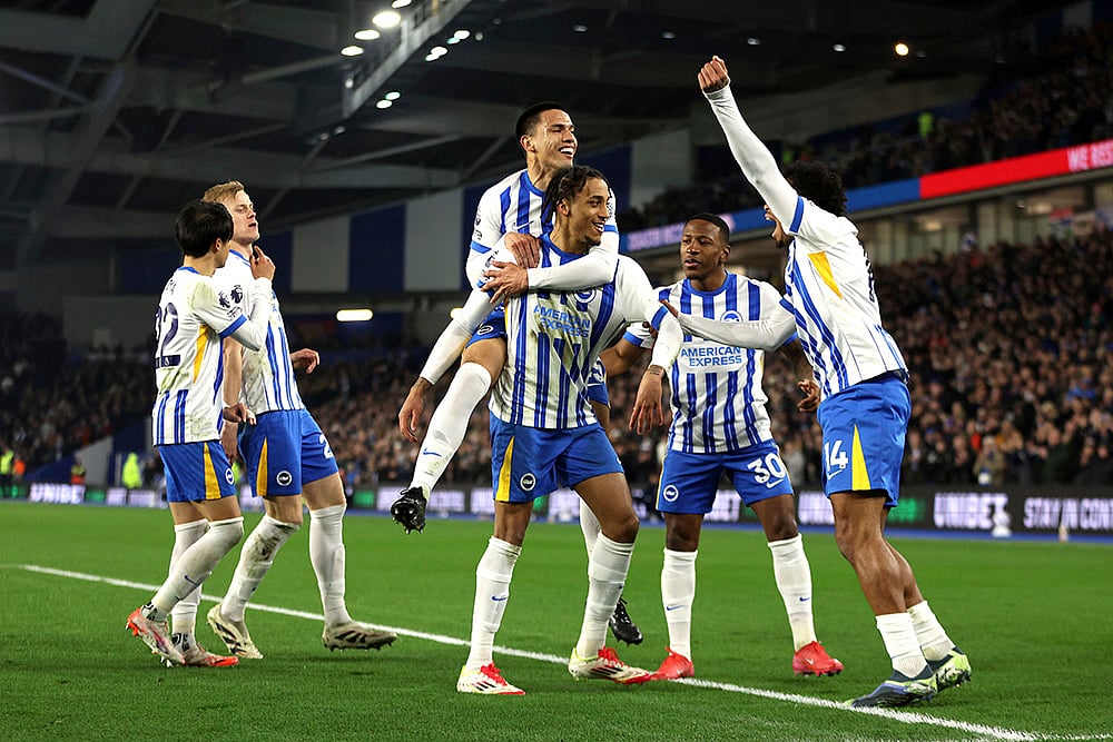 | Photo: Steven Paston/PA via AP : EPL 2024-25, Brighton vs Bournemouth: Brighton's Joao Pedro, center, celebrates scoring his side's first goal