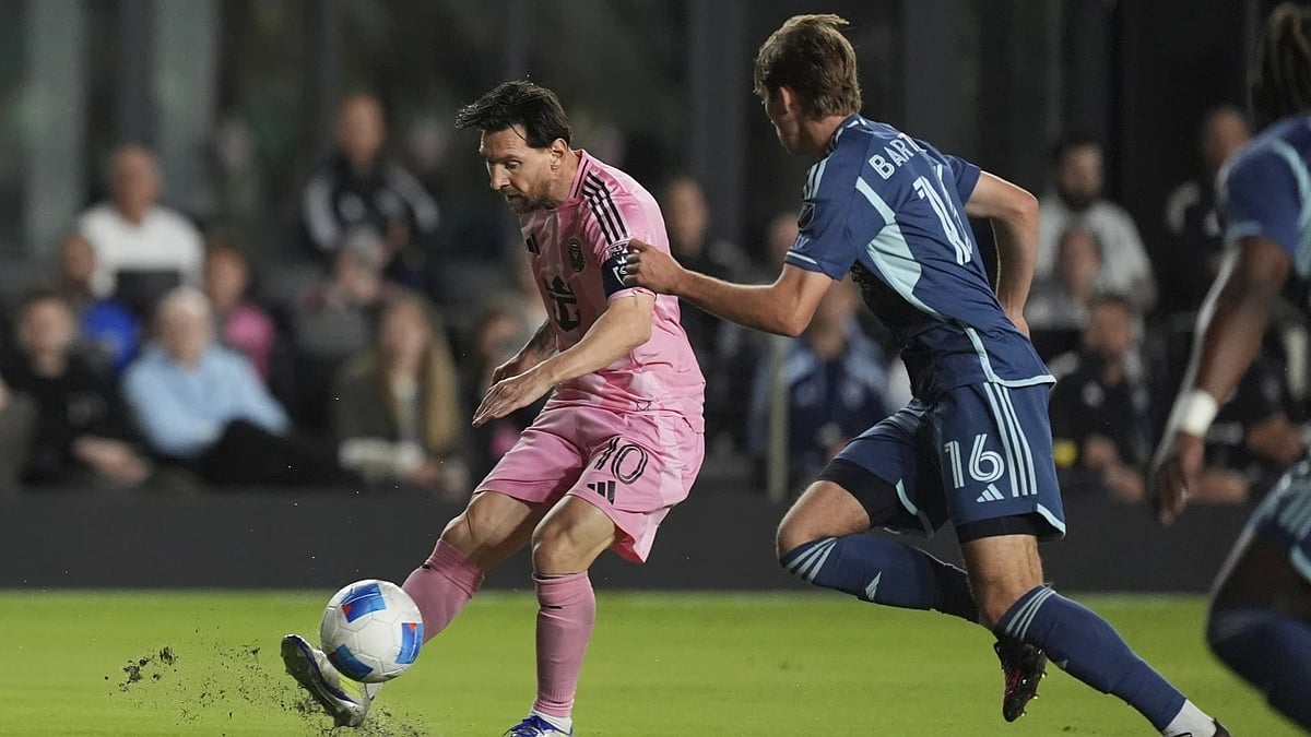 AP : Inter Miami CF captain Lionel Messi in action against Sporting KC in the CONCACF Champions Cup match.