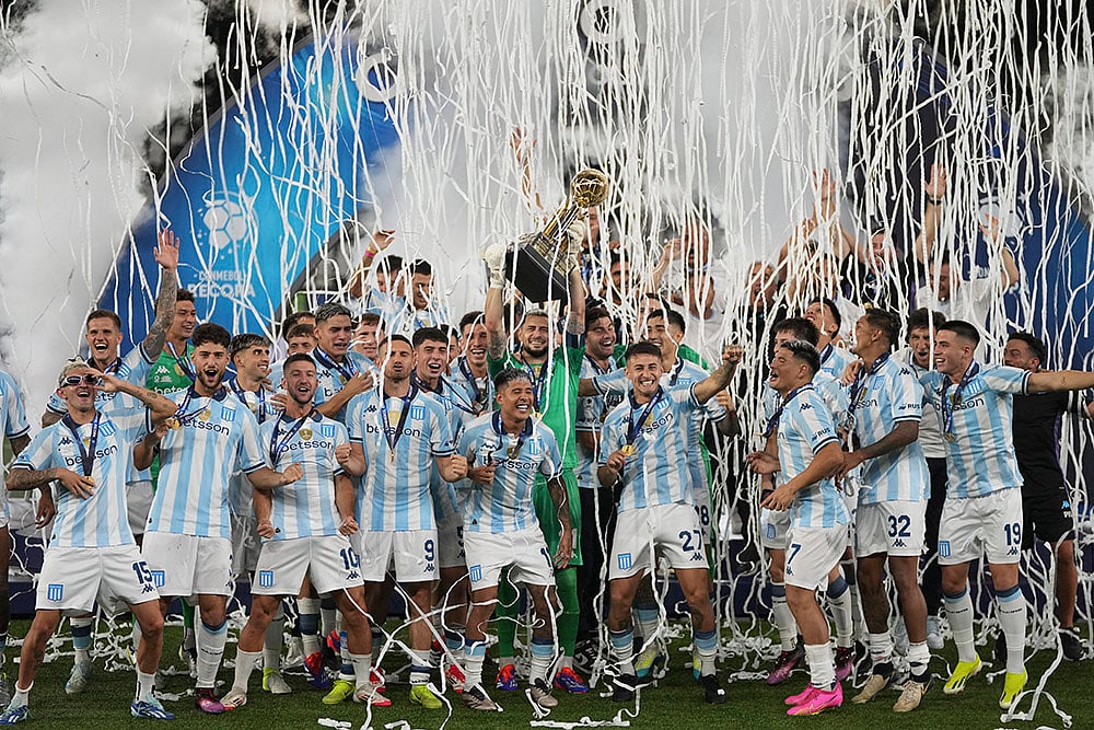 | Photo: AP/Silvia Izquierdo : Recopa Sudamericana 2025 Final: Argentina's Racing Club celebrate with the Recopa Sudamericana trophy 