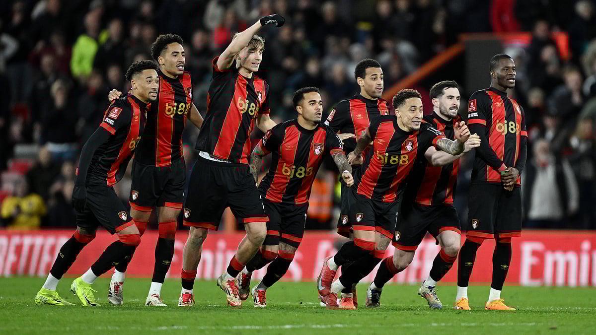 Bournemouth's players celebrate their penalty shoot-out win