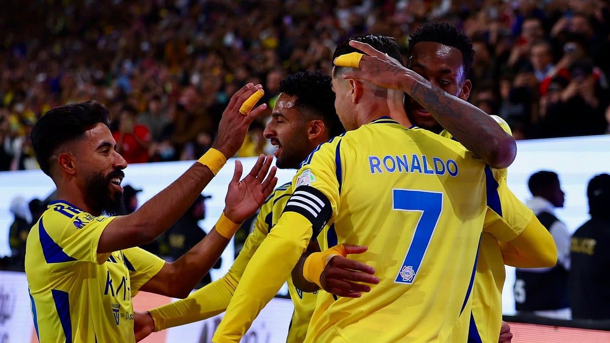 X/Ronaldo : Al-Nassr players celebrate.