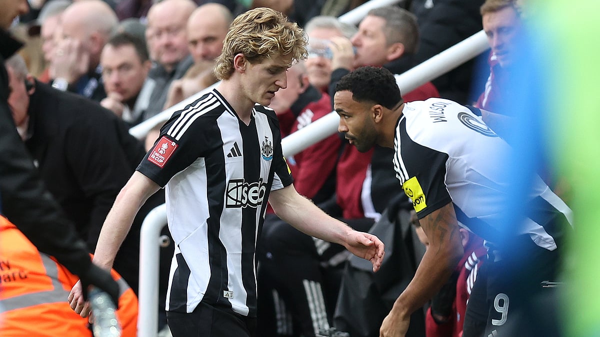 Anthony Gordon trudges off after his red card versus Brighton