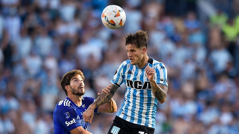 | Photo: AP/Gustavo Garello : Copa Sudamericana Final: Lucas Silva, left, of Brazil's Cruzeiro and Bruno Zuculini of Argentina's Racing Club battle for the ball