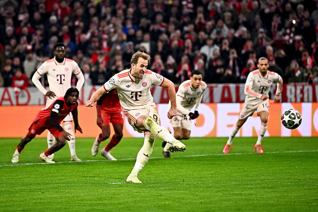 AP : Harry Kane scores his second goal from the penalty spot in the 75th minute.