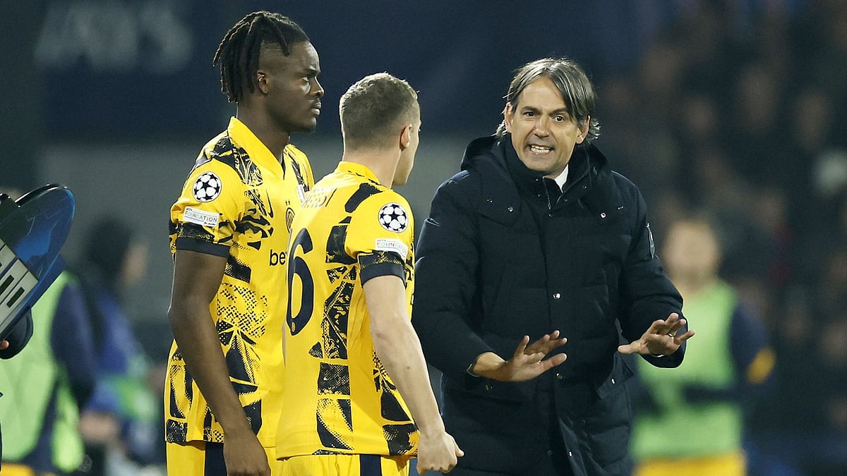 Inzaghi (right) knows Inter's job is not done yet.