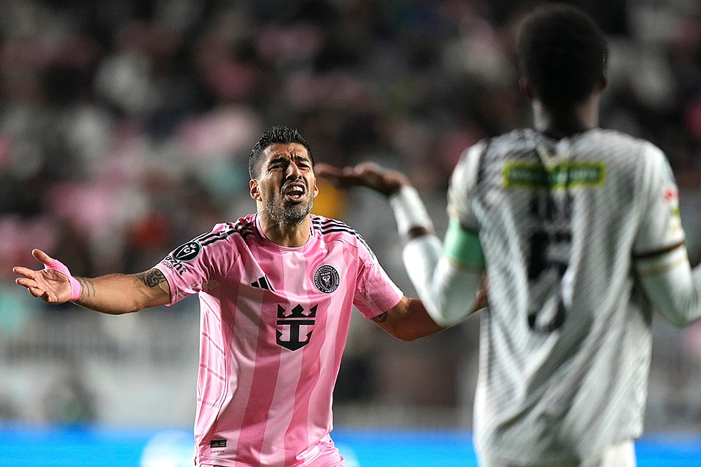 | Photo: AP/Lynne Sladky : CONCACAF Champions Cup: Inter Miami forward Luis Suárez reacts against Cavalier defender Richard King