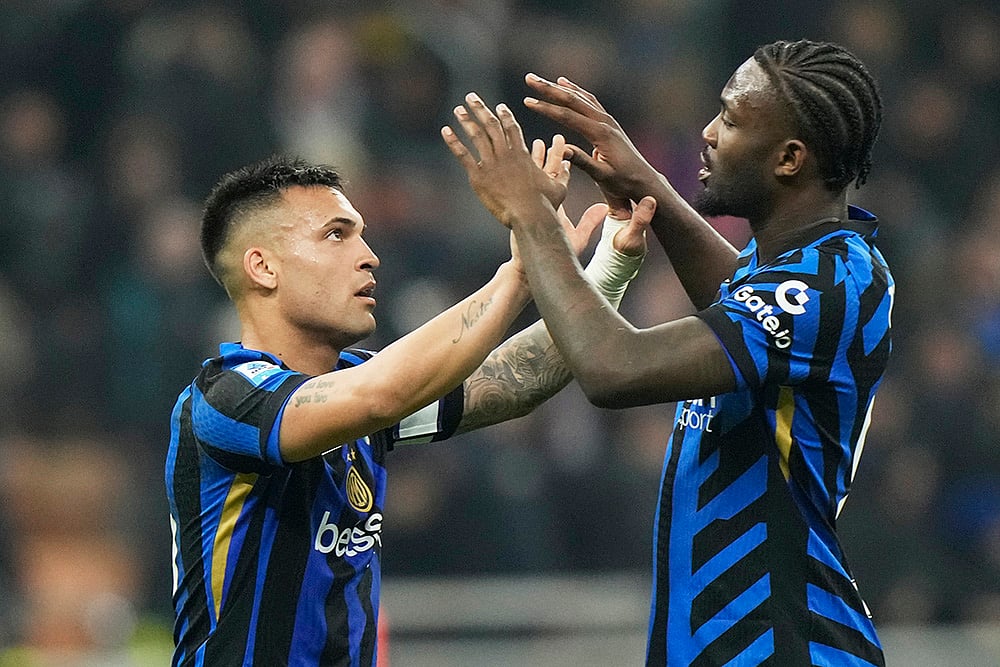 | Photo: AP/Luca Bruno : Serie A, Inter Milan vs Monza: Inter Milan's Lautaro Martinez, left, and Marcus Thuram celebrate after the match