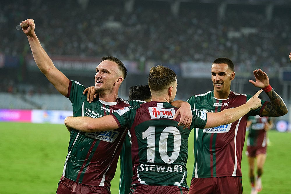 | Photo: FSDL/ISL : ISL 2024-25, MBSG vs FCG: Mohun Bagan players celebrate Greg Stewart's (10) injury-time goal