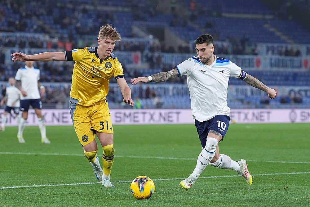 | Photo: Alfredo Falcone/LaPresse via AP : Serie A 2024-25, Lazio vs Udinese: Thomas Kristensen and Mattia Zaccagni challenge for the ball 